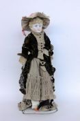 A FASHION DOLL circa 1900 Glazed and painted head with chest and well-detailed hairstyle.