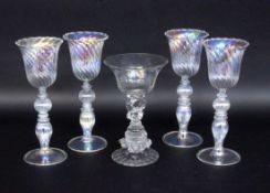 A SET OF 4 VENETIAN WINE GLASSES Probably Murano. Colourless glass with light lustre.