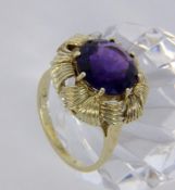 A LADIES RING 585/000 yellow gold with amethyst. Ring size 55, gross weight approximately