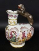 A CAPODIMONTE STYLE WINE JUG With colourfully painted antique dance scenes in the relief.