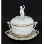 A TUREEN WITH COVER AND SAUCER probably Rudolstadt circa 1900 Circumferential relief