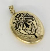 A LOCKET 585/000 yellow gold with finely chased decoration and black enamel. 30 cm long,