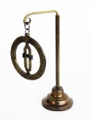 A SUNDIAL Sunwatchmaker, Knittelfeld circa 1900 Brass with engraved city names. With brass