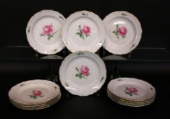 A SET OF 12 DINING PLATES Meissen, 20th century Painted with red rose. Diameter 21.5 cm,