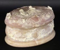 A BOX WITH COVER Alabaster with relief decoration. Children's scene on the hinged lid.