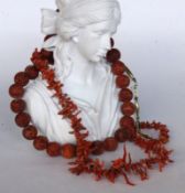 TWO CORAL NECKLACES Necklace with splinter and gold-plated elements, 63 cm long