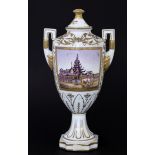 A LIDDED VASE circa 1900 Amphora form with edged handles and curved lid. Gold decoration