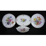 A LOT OF 4 BOWLS / PLATES Meissen with colourfully painted flowers. Crossed sword mark