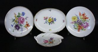 A LOT OF 4 BOWLS / PLATES Meissen with colourfully painted flowers. Crossed sword mark