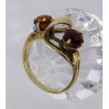 A LADIES RING 585/000 yellow gold with 2 Madeira citrines. Ring size 56, gross weight