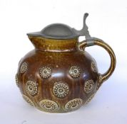 A TANKARD AND COVER R. Merkelbach, Grenzhausen, circa 1900 Brown glazed stoneware with