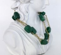 HALSKETTE MIT AVENTURIN.333/000 Gelbgold. l.59,5cmA NECKLACE WITH AVENTURINE 333/000 yellow g