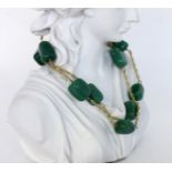 HALSKETTE MIT AVENTURIN.333/000 Gelbgold. l.59,5cmA NECKLACE WITH AVENTURINE 333/000 yellow g