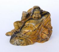 A FIGURE OF GOD WITH FABULOUS CREATURE China, Qing. Figure cut from Jasper. 6.8 cm high.