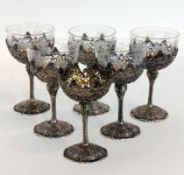 A SET OF 6 LIQUEUR CUPS Hanau circa 1900 Silver 800. Richly decorated mount with 5