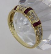 A LADIES RING 585/000 yellow gold with rubies and diamonds. Ring size 62, gross weight