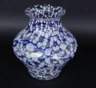 A DECORATIVE VASE probably Loetz, 1920s/1930s Colourless glass with irregularly fused blue