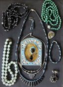 A LOT OF 10 JEWELLERY PIECES WITH GEMSTONES Includes a small frame in Pietra Dura