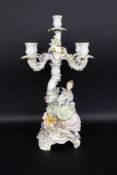 A CANDLESTICK Sitzendorf circa 1900 Baroque form with a Rocaille base and a