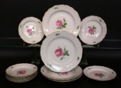 12 PLATES Meissen, 20th century Painted with red rose. 4 soup plates, diameter 26 cm, 2