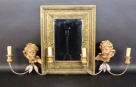 A WALL MIRROR AND A PAIR OF WALL LIGHTS Wood with stucco and gold painting. Mirror 40 x 50