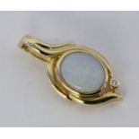 A PENDANT 585/000 yellow gold with solid opal and brilliant cut diamonds. 32 cm long,