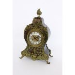 A BOULLE STYLE PENDULUM CLOCK France, 19th century Wooden case in Louis XV style with rich