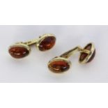 A PAIRS OF CUFFLINKS 585/000 yellow gold with citrines. Gross weight approximately 9