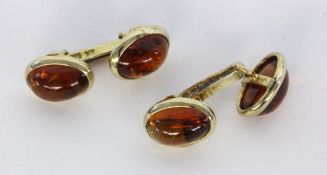 A PAIRS OF CUFFLINKS 585/000 yellow gold with citrines. Gross weight approximately 9