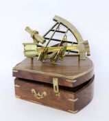 AN ENGLISH SEXTANT T. Cook, London. Brass. In original wooden box with brass fittings.