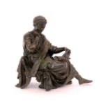 A PHILOSOPHER France circa 1900 Patinated bronze figure of an ancient philosopher reading