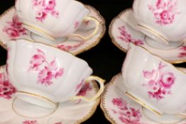 A SET OF 11 COFFEE CUPS WITH SAUCERS Meissen circa 1900 Painted with purple flowers and