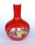 A SMALL DECORATIVE VASE China, probably Qing Porcelain with coral-red glaze and