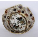 AN ASIAN STYLE PORCELAIN BOWL Painted with chicken and stylized flowers. 11 cm high,