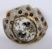 AN ASIAN STYLE PORCELAIN BOWL Painted with chicken and stylized flowers. 11 cm high,