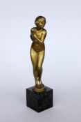 FRANZ IFLAND Berlin 1862 - 1935 Standing female nude. Bronze, gilt on marble base. Total