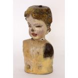 A BAROQUE BUST Probably Rhenish, 18th century Fragments of a putto. Carved wood and