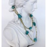 HALSKETTE MIT TÜRKIS-NUGGETSL.57,5cmA NECKLACE WITH TURQUOISE NUGGETS 57.5 cm long.