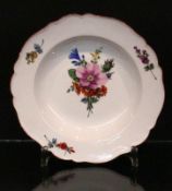 AN EMPIRE PLATE Meissen circa 1800 (Marcolini) Deep plate with coloured flowers. Blue