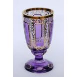 POKAL IM BIEDERMEIERSTILGeschliffenes violettes Glas mit Golddekor. H.19,5cmA BIEDERMEIER STY