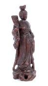 JAPANISCHE GEISHAAus hartem Holz geschnitzte Figur mit Glasaugen. H.31,5cmA JAPANESE GEISHA F