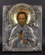 SAINT NICHOLAS Russian icon circa 1900 Colourfully painted Nicholas with silver oklad and
