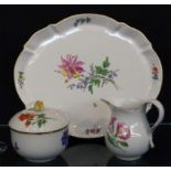 A CREAM SERVICE Meissen, 20th century Painted with colourful flowers. 3 pieces, cream jug,