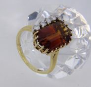 A LADIES RING 585/000 yellow gold with Madeira citrine and brilliant cut diamonds. Ring