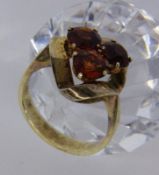 A LADIES RING 585/000 yellow gold with 3 Madeira citrines. Ring size 57, gross weight