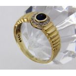 A LADIES RING 585/000 yellow gold with sapphire and diamonds. Ring size 62, gross weight