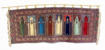 ORIENT WANDTEPPICH 230x87cm AN ORIENTAL TAPESTRY 230 x 87 cm.