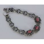 ARMBAND Silber vergoldet mit Rhodochrositen. L.20cm A BRACELET Silver, gold-plated with