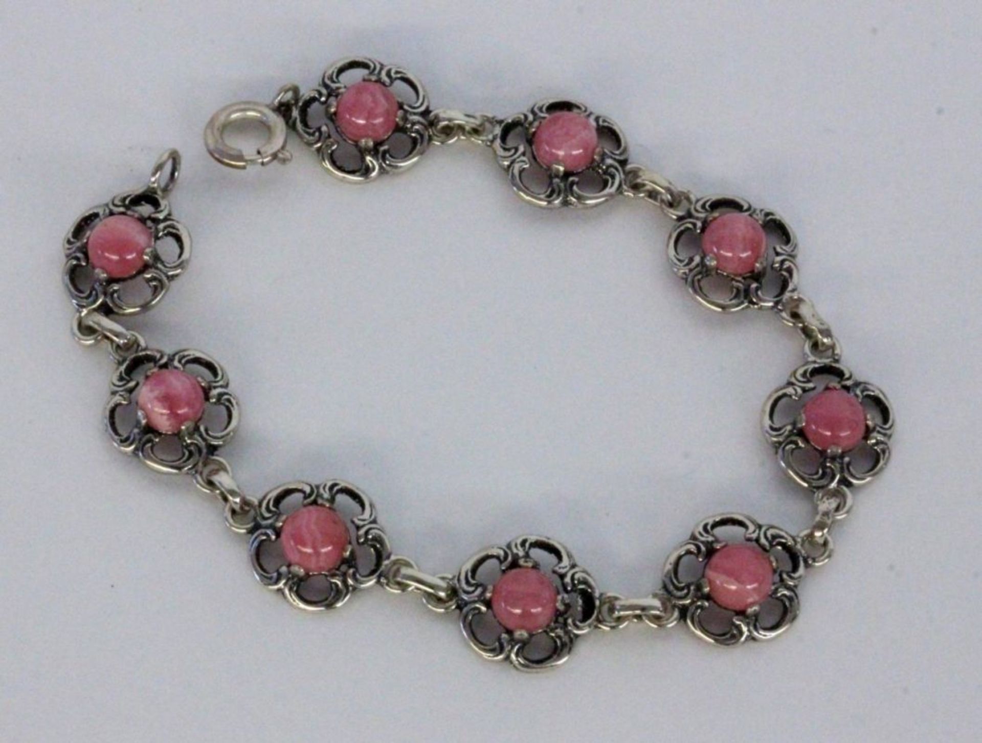 ARMBAND Silber vergoldet mit Rhodochrositen. L.18cm A BRACELET Silver, gold-plated with