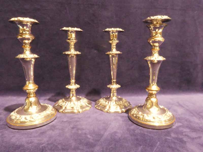 Two pairs of early 20th century silver plated Candlesticks, Rococo Style, some rubbing to plate,